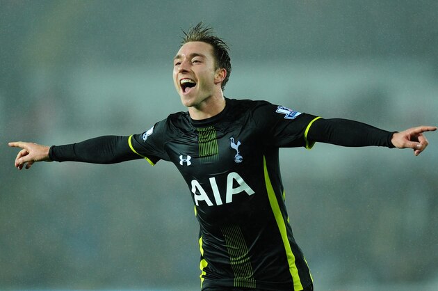 SWANSEA, WALES - DECEMBER 14:  Spurs player Christian Eriksen celebrates after scoring the second Spurs goal during the Barclays Premier League match between Swansea City and Tottenham Hotspur at Liberty Stadium on December 14, 2014 in Swansea, Wales.  (Photo by Stu Forster/Getty Images)