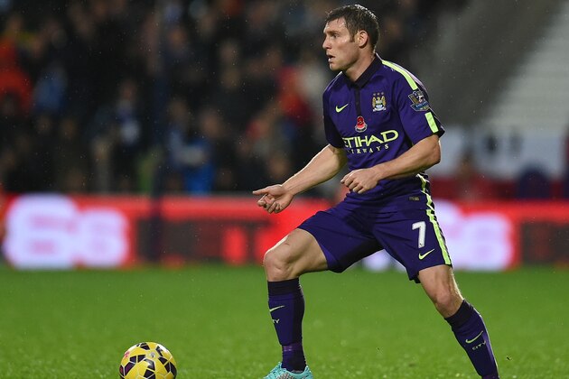 LONDON, ENGLAND - NOVEMBER 08:  James Milner of Manchester City in action during the Barclays Premier League match between Queens Park Rangers and Manchester City at Loftus Road on November 8, 2014 in London, England.  (Photo by Tom Dulat/Getty Images)