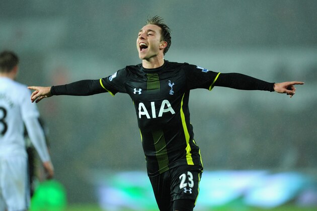 SWANSEA, WALES - DECEMBER 14:  Spurs player Christian Eriksen celebrates after scoring the second Spurs goal during the Barclays Premier League match between Swansea City and Tottenham Hotspur at Liberty Stadium on December 14, 2014 in Swansea, Wales.  (Photo by Stu Forster/Getty Images)