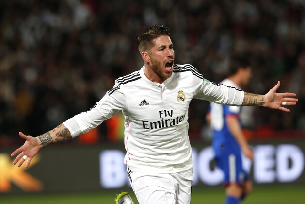 Real Madrid’s Sergio Ramos celebrates his opening goal during the semi final soccer match between Real Madrid and Cruz Azul at the Club World Cup soccer tournament in Marrakech, Morocco, Tuesday, Dec. 16, 2014. (AP Photo/Abdeljalil Bounhar)