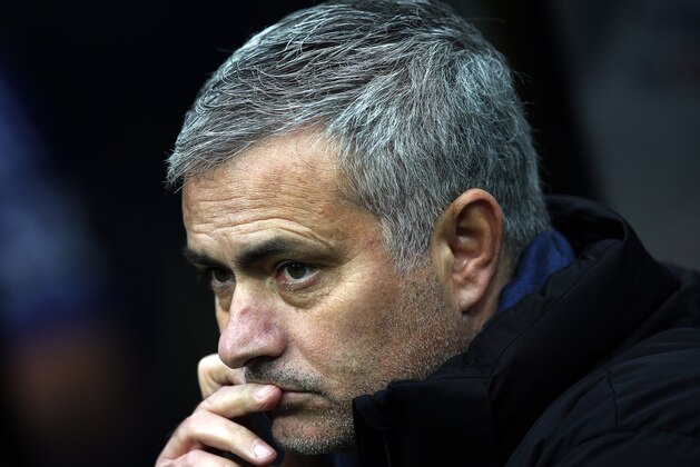 Chelsea's manager Jose Mourinho looks on ahead of their English Premier League soccer match against Newcastle United at St James' Park, Newcastle, England, Saturday, Dec. 6, 2014. (AP Photo/Scott Heppell)