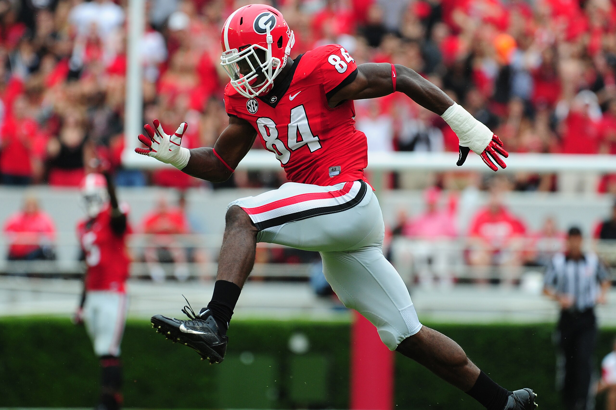 ATHENS, GA - SEPTEMBER 21: Leonard Floyd #84 of the Georgia Bulldogs celebrates after making a tackle against the North Texas Mean Green at Sanford Stadium on September 21, 2013 in Athens, Georgia. (Photo by Scott Cunningham/Getty Images)