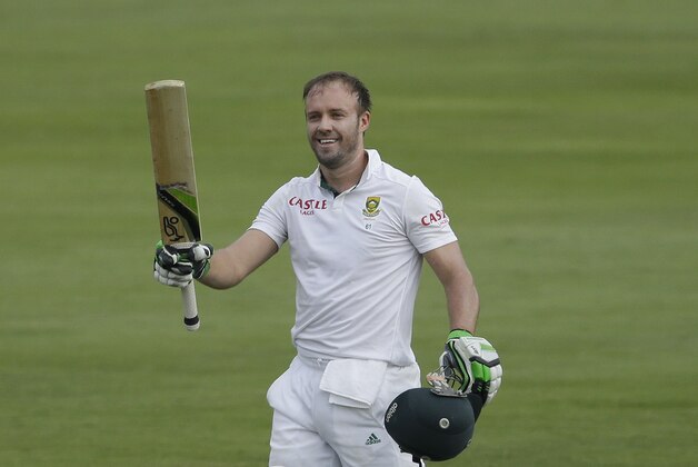 South Africa's batsman AB de Villiers, celebrates his century on the first day of their 1st cricket test match against West Indies at Centurion Park in Pretoria, South Africa, Wednesday, Dec. 17, 2014. (AP Photo/Themba Hadebe)