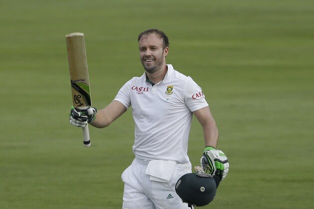 South Africa's batsman AB de Villiers, celebrates his century on the first day of their 1st cricket test match against West Indies at Centurion Park in Pretoria, South Africa, Wednesday, Dec. 17, 2014. (AP Photo/Themba Hadebe)