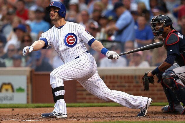 CHICAGO, IL - JULY 11:  Justin Ruggiano #20 of the Chicago Cubs bats against the Atlanta Braves at Wrigley Field on July 11, 2014 in Chicago, Illinois. The Cubs defeated the Braves 5-4.  (Photo by Jonathan Daniel/Getty Images)