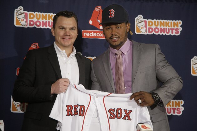 Newly Acquired Boston Red Sox free agent infielder Hanley Ramirez and Red Sox general manager Ben Cherington pose for a photo during a media availability at Fenway Park Tuesday, Nov. 25, 2014 in Boston. (AP Photo/Stephan Savoia)