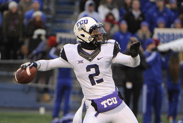 Nov 15, 2014; Lawrence, KS, USA; TCU Horned Frogs quarterback Trevone Boykin (2) throws a pass against the Kansas Jayhawks in the second half at Memorial Stadium. TCU won the game 34-30. Mandatory Credit: John Rieger-USA TODAY Sports