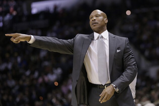 Los Angeles Lakers head coach Byron Scott gives direction to his players during the first half of an NBA basketball game against the San Antonio Spurs, Friday, Dec. 12, 2014, in San Antonio. (AP Photo/Eric Gay)