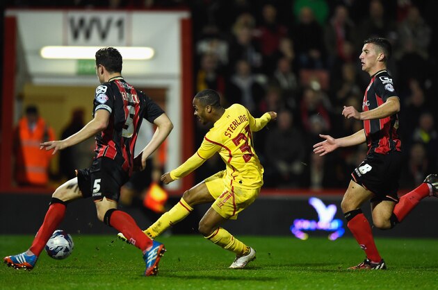 BOURNEMOUTH, ENGLAND - DECEMBER 17:  Raheem Sterling of Liverpool scores his team's third goal during the Capital One Cup Quarter-Final match between Bournemouth and Liverpool at Goldsands Stadium on December 17, 2014 in Bournemouth, England.  (Photo by Mike Hewitt/Getty Images)