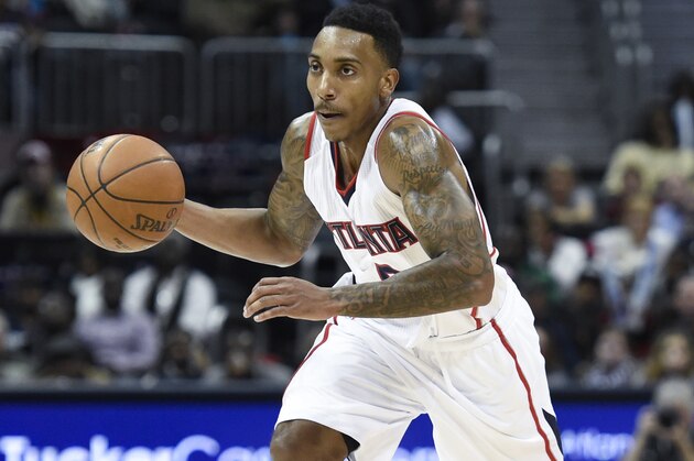 Dec 12, 2014; Atlanta, GA, USA; Atlanta Hawks guard Jeff Teague (0) brings the ball up the court against the Orlando Magic during the second half at Philips Arena. The Hawks defeated the Magic 87-81. Mandatory Credit: Dale Zanine-USA TODAY Sports