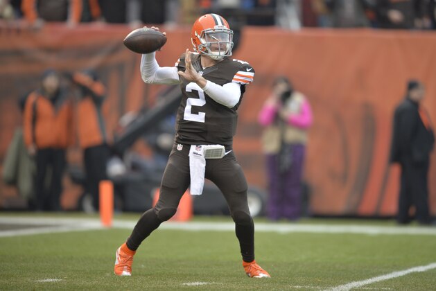 Cleveland Browns quarterback Johnny Manziel passes against the Cincinnati Bengals in the second quarter of an NFL football game Sunday, Dec. 14, 2014, in Cleveland. Cincinnati won 30-0. (AP Photo/David Richard)