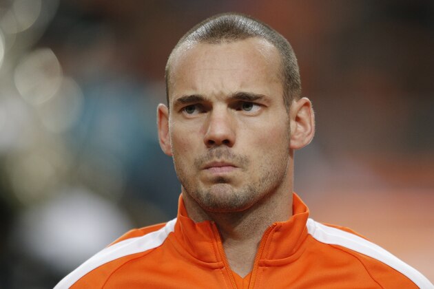 Netherlands' Wesley Sneijder lines up prior to  the Euro 2016 group A qualifying round soccer match between the Netherlands and Latvia at ArenA stadium in Amsterdam, Netherlands, Sunday, Nov. 16, 2014. (AP Photo/Peter Dejong)