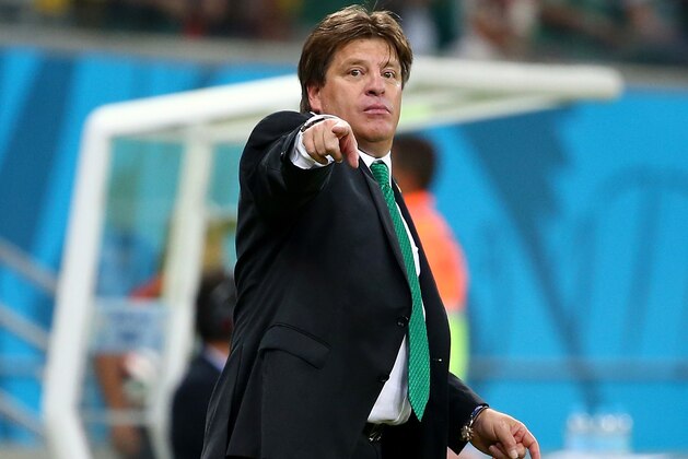 RECIFE, BRAZIL - JUNE 23:  Head coach Miguel Herrera of Mexico gestures during the 2014 FIFA World Cup Brazil Group A match between Croatia and Mexico at Arena Pernambuco on June 23, 2014 in Recife, Brazil.  (Photo by Robert Cianflone/Getty Images)
