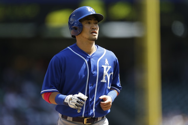 Kansas City Royals' Nori Aoki walks to the dugout during a baseball game against the Seattle Mariners, Sunday, May 11, 2014 in Seattle. (AP Photo/Ted S. Warren)