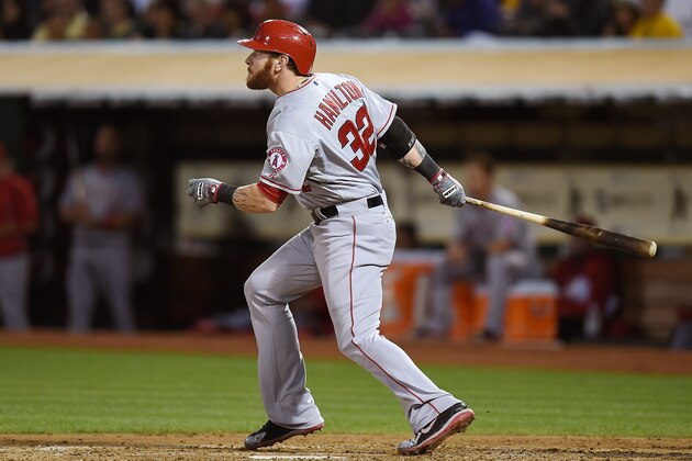 OAKLAND, CA - AUGUST 22:  Josh Hamilton #32 of the Los Angeles Angels of Anaheim hits a solo home run against the Oakland Athletics in the top of the fourth inning at O.co Coliseum on August 22, 2014 in Oakland, California.  (Photo by Thearon W. Henderson/Getty Images)