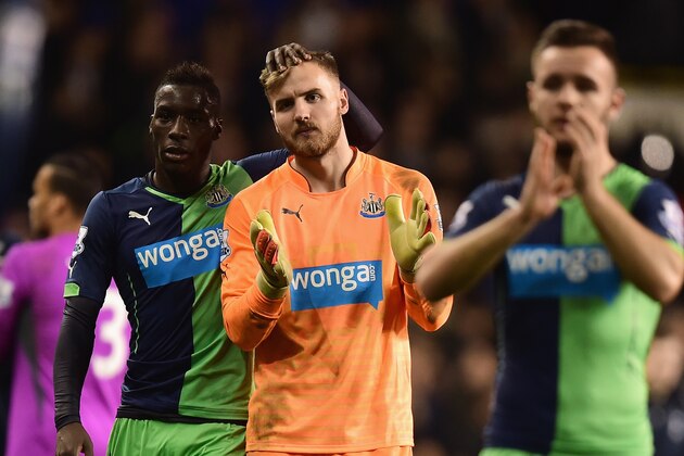 LONDON, ENGLAND - DECEMBER 17:  Goalkeeper Jak Alnwick of Newcastle United is consoled by Massadio Haidara of Newcastle United after the Capital One Cup Quarter-Final match between Tottenham Hotspur and Newcastle United at White Hart Lane on December 17, 2014 in London, England.  (Photo by Jamie McDonald/Getty Images)
