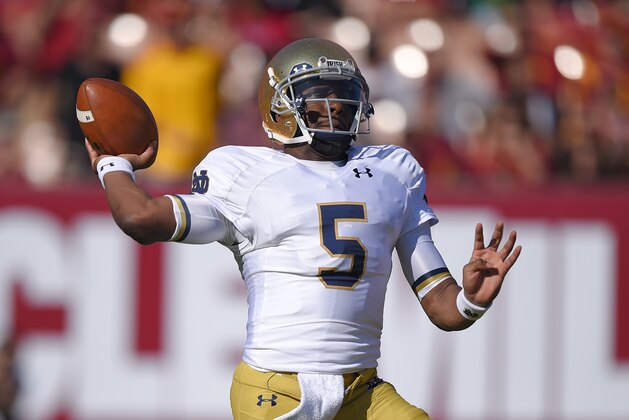 Notre Dame quarterback Everett Golson prepares to pass during the first half of an NCAA college football game against Southern California, Saturday, Nov. 29, 2014, in Los Angeles. (AP Photo/Mark J. Terrill)