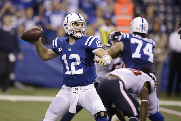 Indianapolis Colts quarterback Andrew Luck throws against the Houston Texans during the second half of an NFL football game in Indianapolis, Sunday, Dec. 14, 2014. (AP Photo/Darron Cummings)