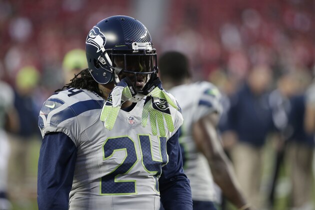 Seattle Seahawks running back Marshawn Lynch (24) warms up before an NFL football game against the San Francisco 49ers in Santa Clara, Calif., Thursday, Nov. 27, 2014. (AP Photo/Marcio Jose Sanchez)