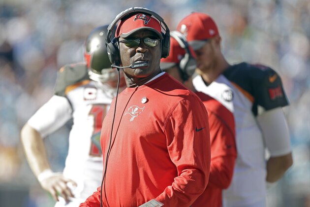 Tampa Bay Buccaneers' head coach Lovie Smith on the sidelines against the Carolina Panthers during the first half of an NFL football game in Charlotte, N.C., Sunday, Dec. 14, 2014. The Panthers won 19-17. (AP Photo/Bob Leverone)
