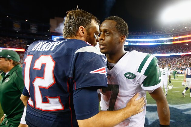 FOXBORO, MA - OCTOBER 16:  Geno Smith #7 of the New York Jets hugs Tom Brady #12 of the New England Patriots after a game at Gillette Stadium on October 16, 2014 in Foxboro, Massachusetts.  (Photo by Jared Wickerham/Getty Images)