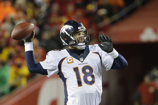 Denver Broncos quarterback Peyton Manning (18) throws in the first half of an NFL football game against the Kansas City Chiefs in Kansas City, Mo., Sunday, Nov. 30, 2014. (AP Photo/Charlie Riedel)