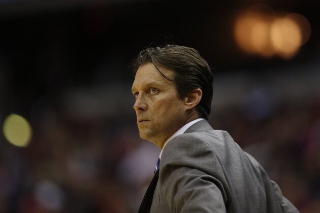 Utah Jazz head coach Quin Snyder watches his team in the first half of an NBA basketball game against the Washington Wizards, Sunday, Dec. 14, 2014, in Washington. (AP Photo/Alex Brandon)