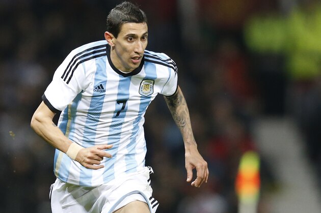 Angel Di Maria of Argentina is seen during his team's  International Friendly soccer match against Portugal at Old Trafford Stadium, Manchester, England, Tuesday Nov. 18, 2014. (AP Photo/Jon Super)