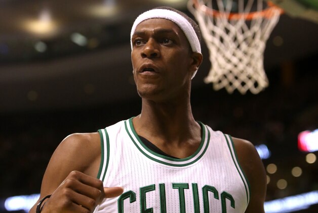 BOSTON, MA - NOVEMBER 14: Rajon Rondo #9 of the Boston Celtics reacts after a play against the Cleveland Cavaliers at TD Garden on November 14, 2014 in Boston, Massachusetts. NOTE TO USER: User expressly acknowledges and agrees that, by downloading and or using this photograph, User is consenting to the terms and conditions of the Getty Images License Agreement.  (Photo by Mike Lawrie/Getty Images)