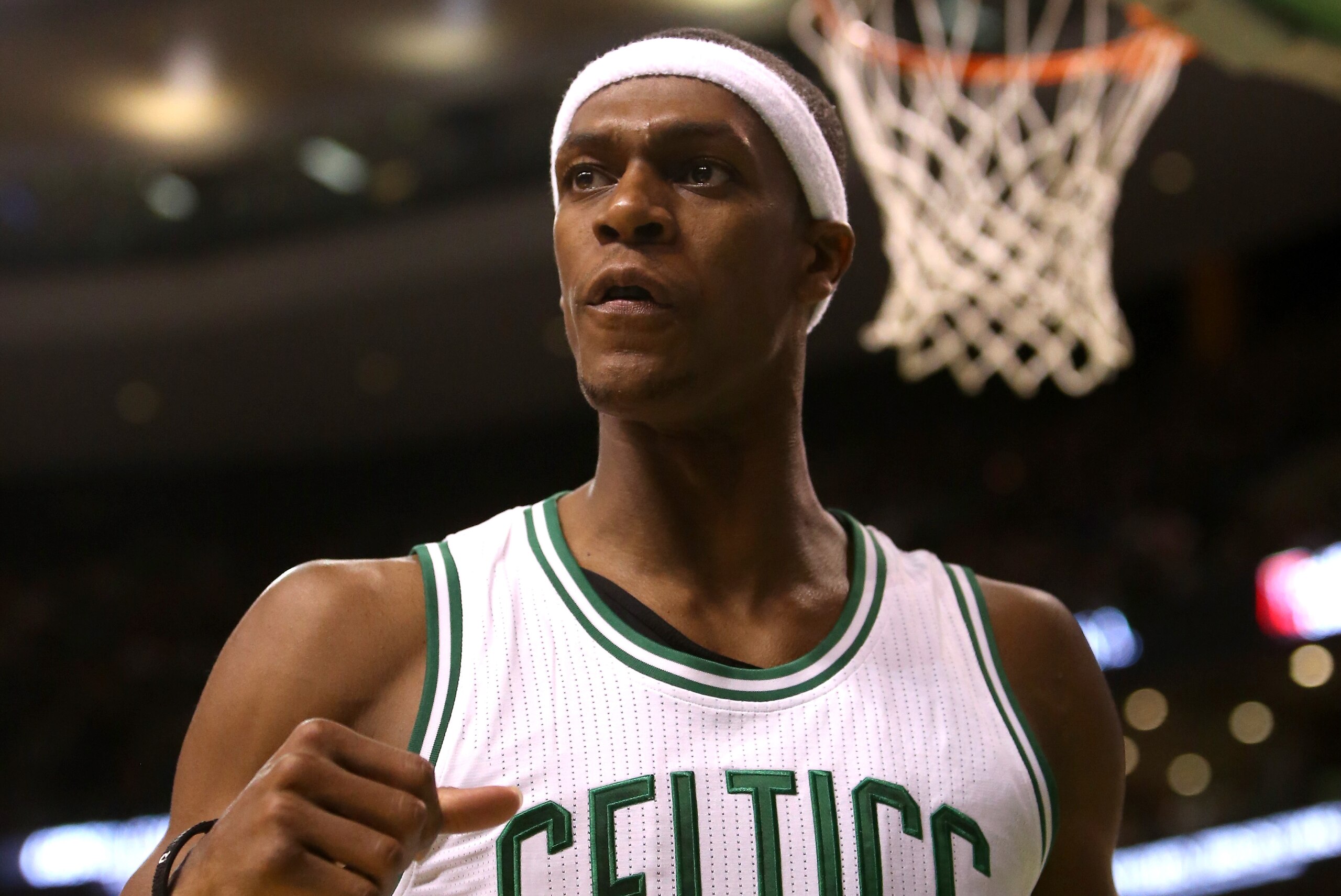 BOSTON, MA - NOVEMBER 14: Rajon Rondo #9 of the Boston Celtics reacts after a play against the Cleveland Cavaliers at TD Garden on November 14, 2014 in Boston, Massachusetts. NOTE TO USER: User expressly acknowledges and agrees that, by downloading and or using this photograph, User is consenting to the terms and conditions of the Getty Images License Agreement.  (Photo by Mike Lawrie/Getty Images)