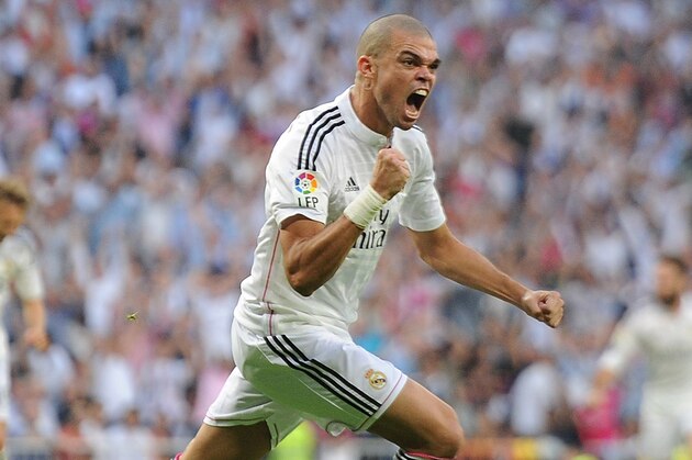 MADRID, SPAIN - OCTOBER 25:  Pepe of Real Madrid CF celebrates after scoring his team's 2nd goal from the penalty spot during the La Liga match between Real Madrid CF and FC Barcelona at Estadio Santiago Bernabeu on October 25, 2014 in Madrid, Spain.  (Photo by Denis Doyle/Getty Images)