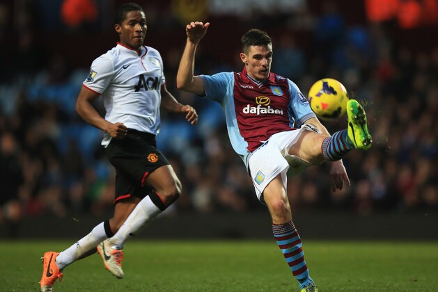 BIRMINGHAM, ENGLAND - DECEMBER 15: Ciaran Clark of Aston Villa clears the ball from Luis Antonio Valencia of Manchester United during the Barclays Premier League match between Aston Villa and Manchester United at Villa Park on December 15, 2013 in Birmingham, England. (Photo by Richard Heathcote/Getty Images) BIRMINGHAM, ENGLAND - DECEMBER 15: Ciaran Clark of Aston Villa clears the ball from Luis Antonio Valencia of Manchester United during the Barclays Premier League match between Aston Villa and Manchester United at Villa Park on December 15, 2013 in Birmingham, England. (Photo by Richard Heathcote/Getty Images)