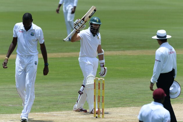 PRETORIA, SOUTH AFRICA - DECEMBER 18: Hashim Amla of South Africa celebrates his 150 during day 2 of the 1st Test match between South Africa and West Indies at SuperSport Park on December 18, 2014 in Pretoria, South Africa. (Photo by Duif du Toit/Gallo Images/Getty Images)