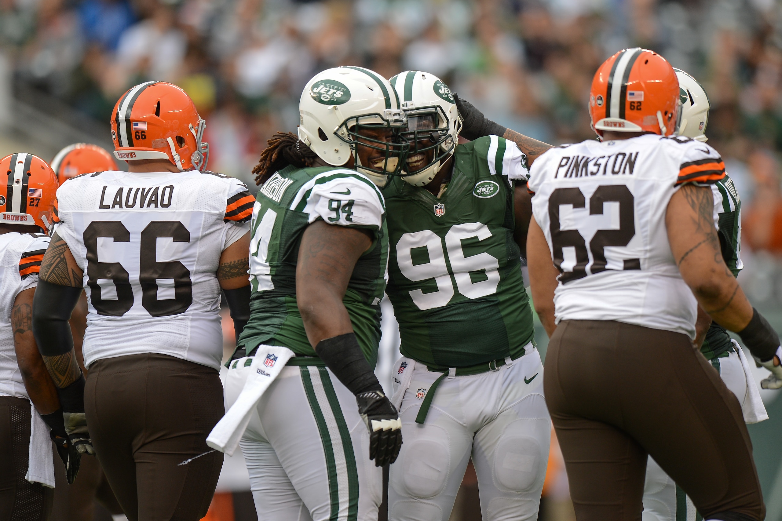 EAST RUTHERFORD, NJ - DECEMBER 22: Nose tackle Damon Harrison #94 of the New York Jets and defensive end Muhammad Wilkerson #96 of the New York Jets celebrate during the 1st half against the Cleveland Browns at MetLife Stadium on December 22, 2013 in East Rutherford, New Jersey. (Photo by Ron Antonelli/Getty Images) EAST RUTHERFORD, NJ - DECEMBER 22: Nose tackle Damon Harrison #94 of the New York Jets and defensive end Muhammad Wilkerson #96 of the New York Jets celebrate during the 1st half against the Cleveland Browns at MetLife Stadium on December 22, 2013 in East Rutherford, New Jersey. (Photo by Ron Antonelli/Getty Images)