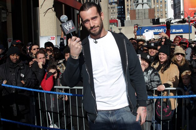WWE Superstar CM Punk poses at Madison Square Garden, Friday, Nov. 18, 2011, in New York, during a rally leading up to the 25th Anniversary of Survivor Series, taking place Sunday at Madison Square Garden.  The event will feature actor and wrestling favorite Dwayne