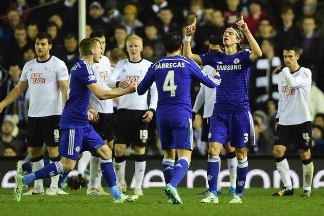 DERBY, ENGLAND - DECEMBER 16:  Filipe Luis of Chelsea celebrates scoring his team's second goal during the Capital One Cup Quarter-Final match between Derby County and Chelsea at Pride Park Stadium on December 16, 2014 in Derby, England.  (Photo by Jamie McDonald/Getty Images)