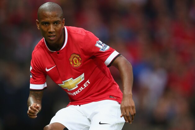 MANCHESTER, ENGLAND - AUGUST 12:  Ashley Young of Manchester United in action during the Pre Season Friendly match between Manchester United and Valencia at Old Trafford on August 12, 2014 in Manchester, England.  (Photo by Clive Brunskill/Getty Images)