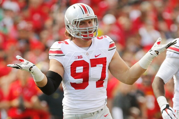 COLLEGE PARK, MD - OCTOBER 04:  Defensive end Joey Bosa #97 of the Ohio State Buckeyes celebrates after one of his first-half sacks against the Maryland Terrapins at Byrd Stadium on October 4, 2014 in College Park, Maryland. Also pictured is teammate Steve Miller #88. (Photo by Jonathan Ernst/Getty Images)