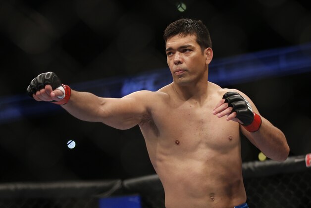 Lyoto Machida Dan Henderson during their UFC 157 light heavyweight mixed martial arts match in Anaheim, Calif., Saturday, Feb. 23, 2013. Machida won by split decision after the third round. (AP Photo/Jae C. Hong)