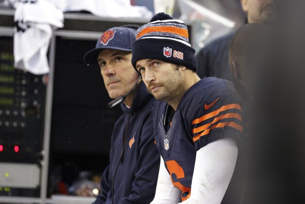 Chicago Bears quarterback Jay Cutler (6) watches from the bench in the second half of an NFL football game against the Tampa Bay Buccaneers Sunday, Nov. 23, 2014, in Chicago. (AP Photo/Nam Y. Huh)
