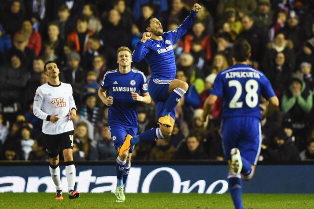 DERBY, ENGLAND - DECEMBER 16:  Eden Hazard of Chelsea celebrates his goal during the Capital One Cup Quarter-Final match between Derby County and Chelsea at Pride Park Stadium on December 16, 2014 in Derby, England.  (Photo by Laurence Griffiths/Getty Images)