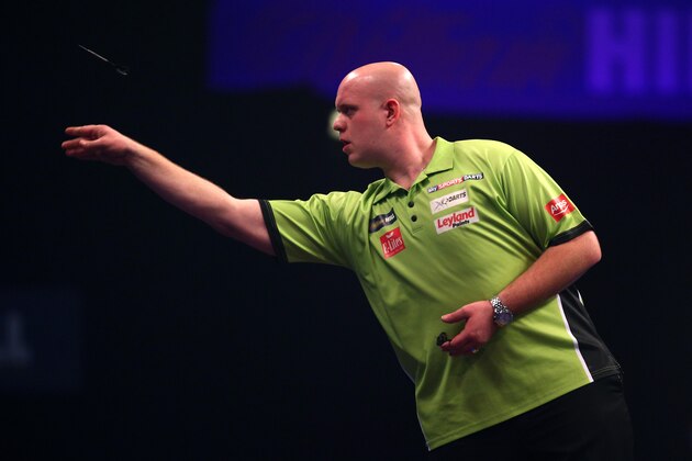LONDON, ENGLAND - DECEMBER 18: Michael van Gerwen of Holland in action during his first round match against Joe Cullen of England during the William Hill PDC World Darts Championships on Day One at Alexandra Palace on December 18, 2014 in London, England. (Photo by Charlie Crowhurst/Getty Images)