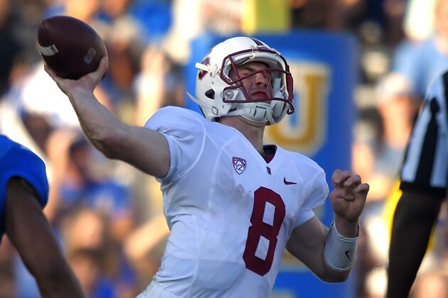 Stanford quarterback Kevin Hogan passes during the second half of an NCAA college football game against UCLA, Friday, Nov. 28, 2014, in Pasadena, Calif. Stanford won 31-10. (AP Photo/Mark J. Terrill)