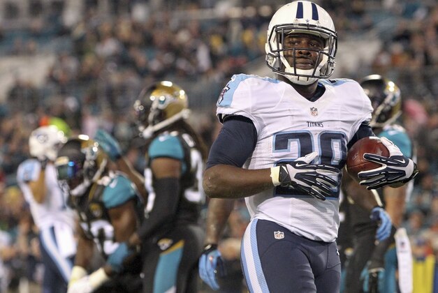 Dec 18, 2014; Jacksonville, FL, USA; Tennessee Titans running back Leon Washington (29) reacts after he scored a touchdown against the Jacksonville Jaguars during the first quarter at EverBank Field. Mandatory Credit: Kim Klement-USA TODAY Sports