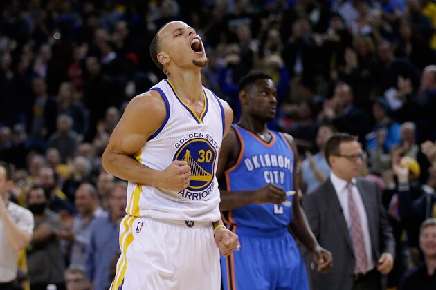 OAKLAND, CA - DECEMBER 18:  Stephen Curry #30 of the Golden State Warriors reacts after the Warriors took the lead in the second quarter of their game against the Oklahoma City Thunder at ORACLE Arena on December 18, 2014 in Oakland, California. NOTE TO USER: User expressly acknowledges and agrees that, by downloading and or using this photograph, User is consenting to the terms and conditions of the Getty Images License Agreement.  (Photo by Ezra Shaw/Getty Images)