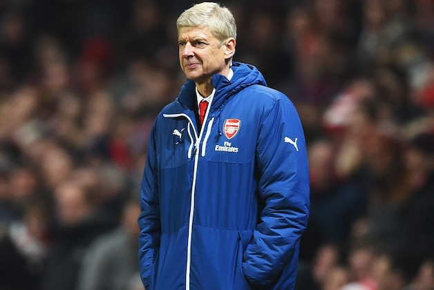 LONDON, ENGLAND - DECEMBER 13:  Arsene Wenger, manager of Arsenal smiles after the second goal of Olivier Giroud of Arsenal during the Barclays Premier League match between Arsenal and Newcastle United at Emirates Stadium on December 13, 2014 in London, England.  (Photo by Paul Gilham/Getty Images)