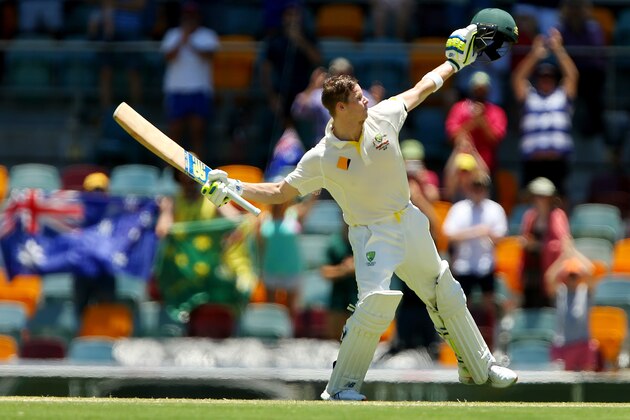 BRISBANE, AUSTRALIA - DECEMBER 19:  Australian captain Steve Smith celebrates scoring a century during day three of the 2nd Test match between Australia and India at The Gabba on December 19, 2014 in Brisbane, Australia.  (Photo by Chris Hyde/Getty Images)