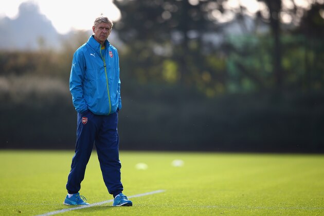 ST ALBANS, ENGLAND - SEPTEMBER 30:  Manager Arsene Wenger of Arsenal looks on during an Arsenal training session ahead of their UEFA Champions League Group D match against Galatasaray at London Colney on September 30, 2014 in St Albans, England.  (Photo by Paul Gilham/Getty Images)