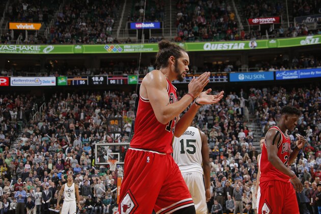 SALT LAKE CITY, UT - NOVEMBER 24: Joakim Noah #13 of the Chicago Bulls celebrates during a game against the Utah Jazz at EnergySolutions Arena on November 24, 2014 in Salt Lake City, Utah. NOTE TO USER: User expressly acknowledges and agrees that, by downloading and or using this Photograph, User is consenting to the terms and conditions of the Getty Images License Agreement. Mandatory Copyright Notice: Copyright 2014 NBAE (Photo by Rocky Widner/NBAE via Getty Images)