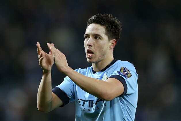 LEICESTER, ENGLAND - DECEMBER 13:  Samir Nasri of Manchester City celebrates following his team's 1-0 victory during the Barclays Premier League match between Leicester City and Manchester City at The King Power Stadium on December 13, 2014 in Leicester, England.  (Photo by Clive Mason/Getty Images)